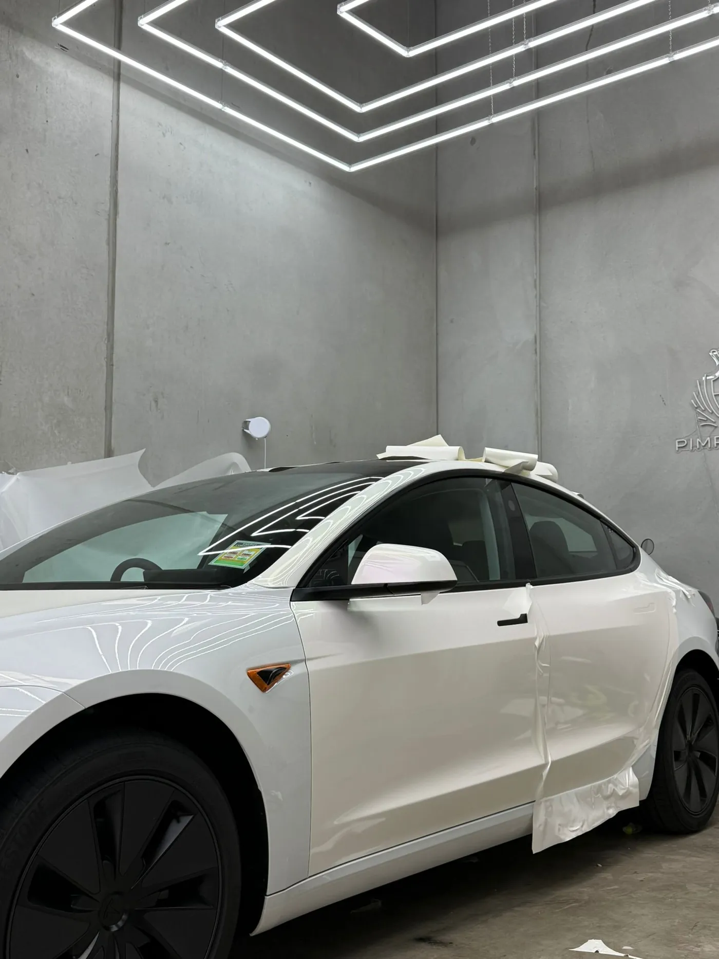 Tesla Model 3 getting paint protection film at PIMPMYCAR